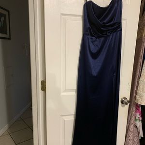 Women formal dress. Worn once at homecoming. Like new. Midnight blue. Size M